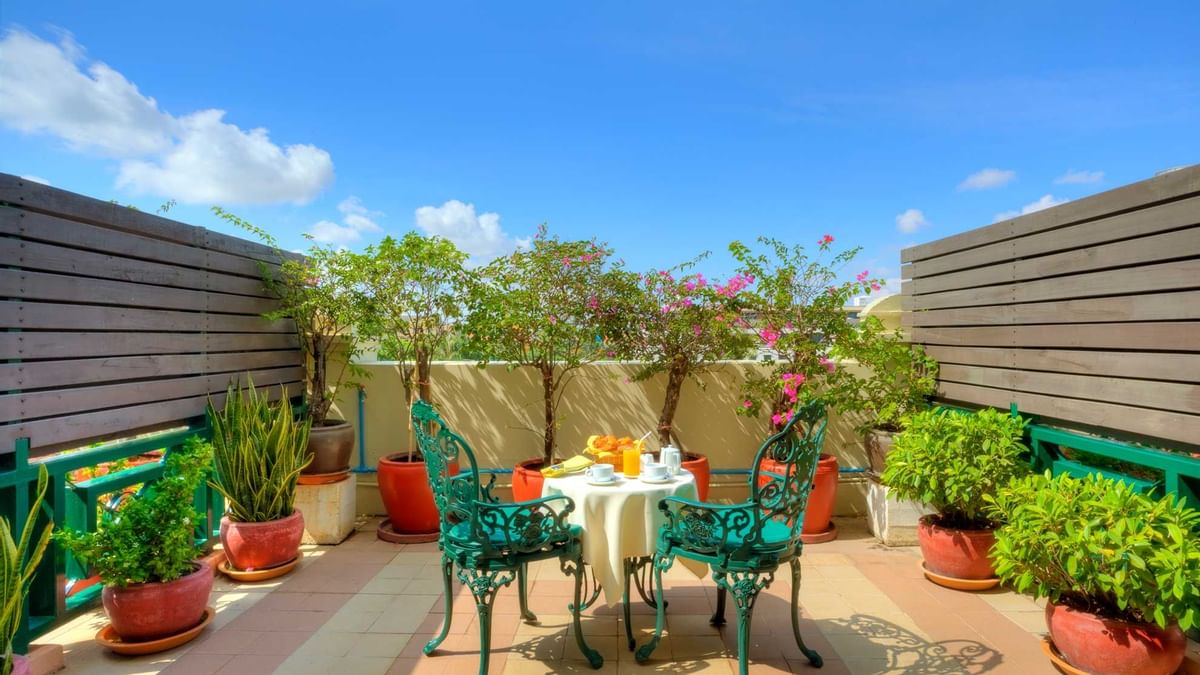 Two comfy beds and lounge in Deluxe Park Twin Room at Sunway Hotels & Resorts