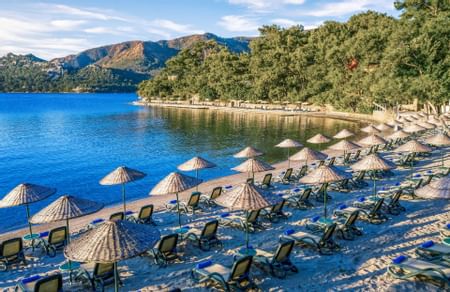 Beach area with sunbeds near the Marmaris Bay