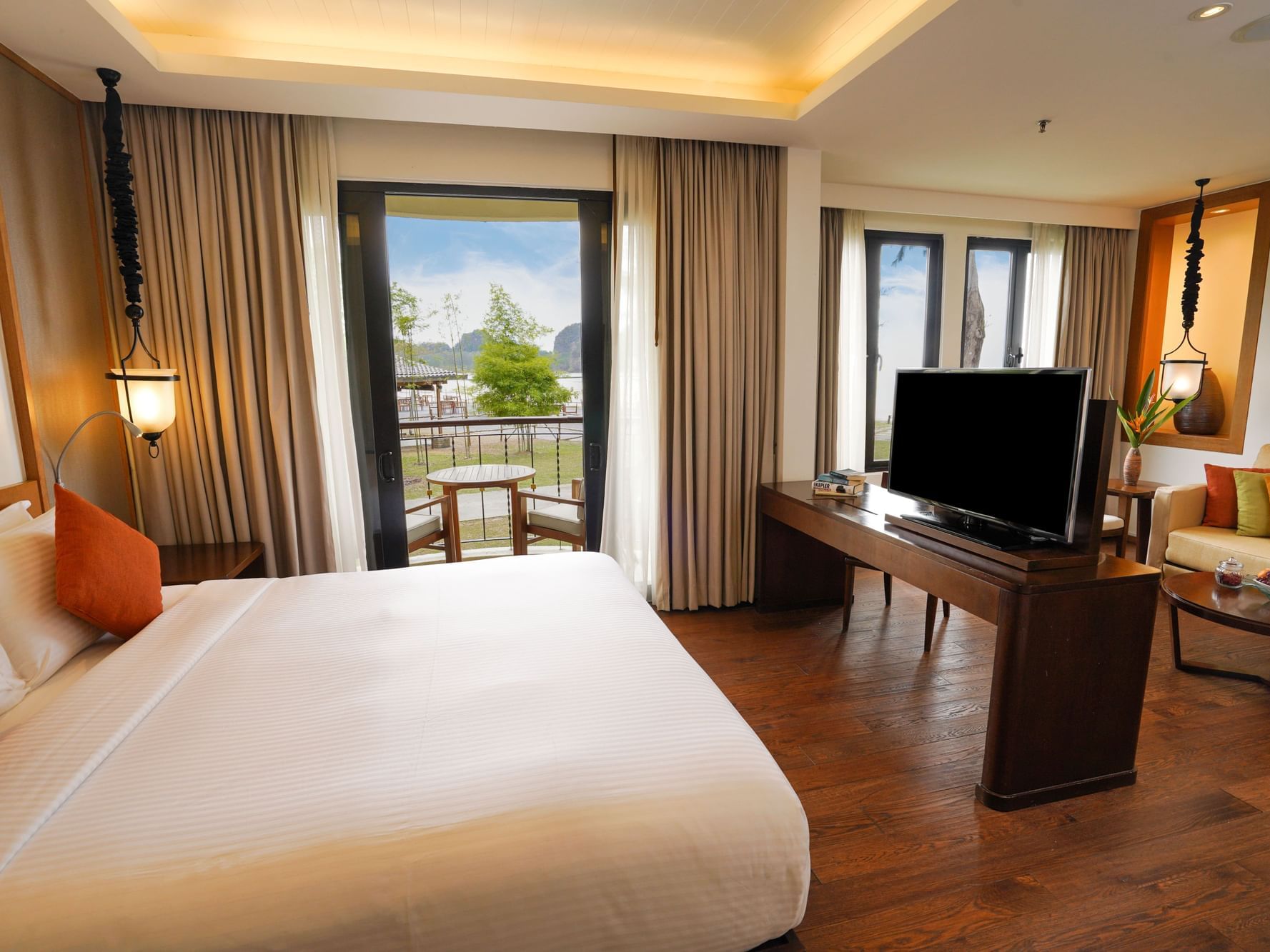 Bed & TV in Bayu Suria Suite at Tanjung Rhu Resort Langkawi