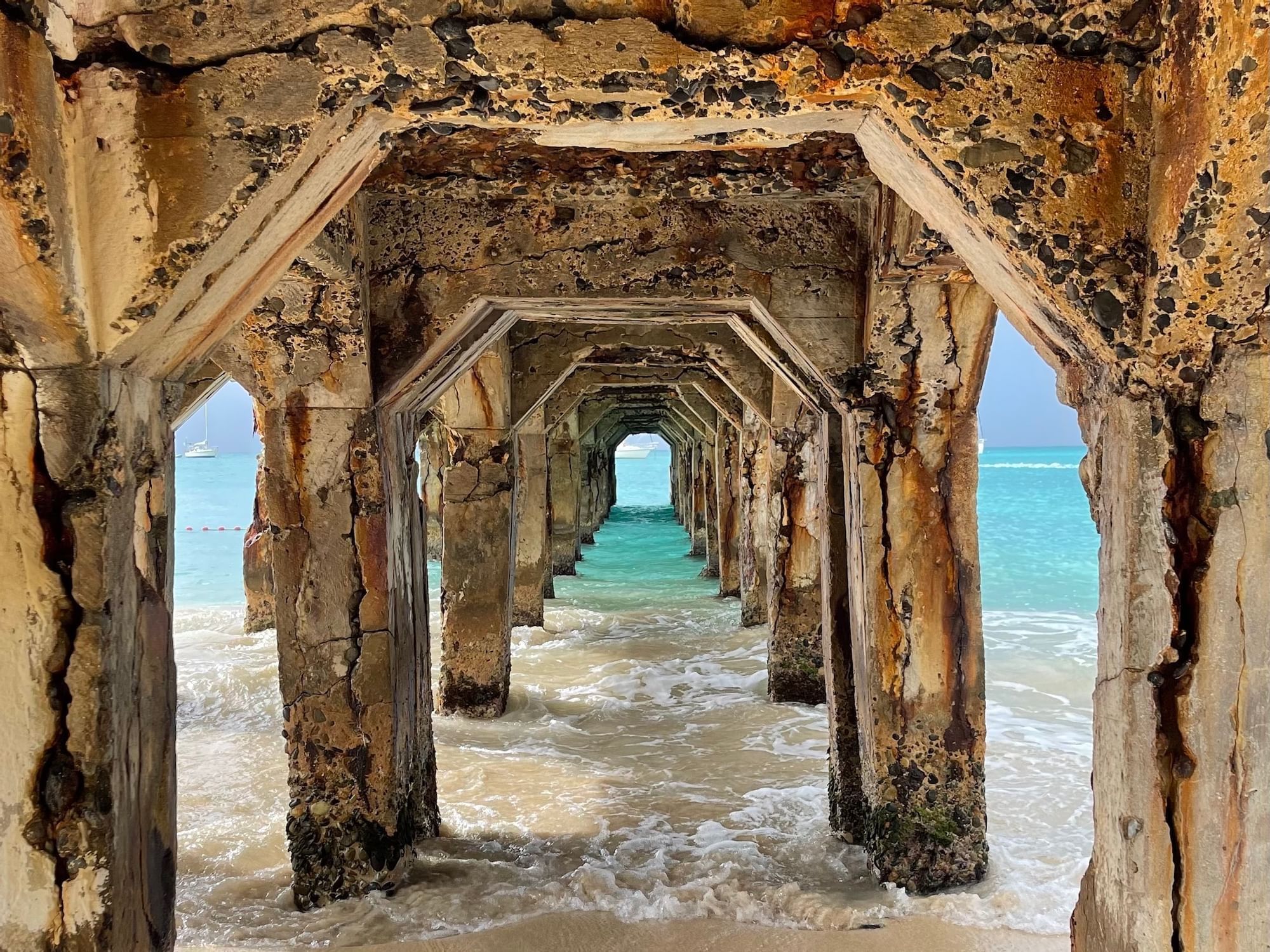 View of under an ocean pier near The Morgan Resort Spa Village