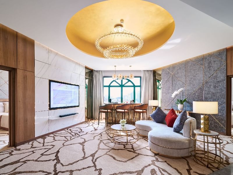 Living area with sofa and TV in Junior Suite at Sunway Velocity Hotel