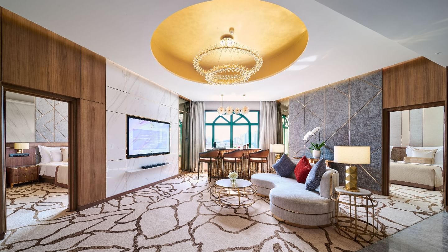 Living area with sofa and TV in Junior Suite at Sunway Velocity Hotel