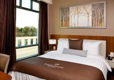 a bed in a hotel suite