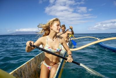 A couple kayaking in the ocean at Ka'anapali Beach Hotel Hawaii