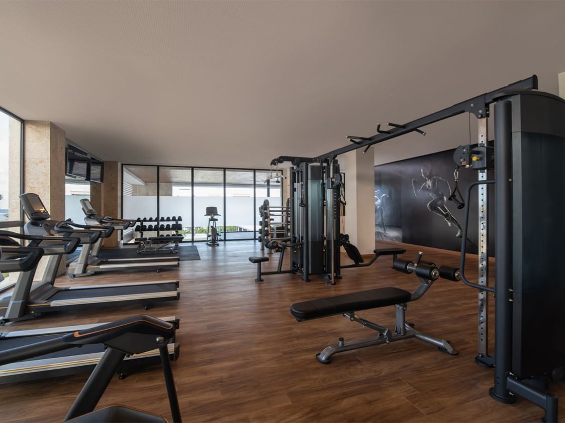 Fitness center with treadmills at La Colección Resorts
