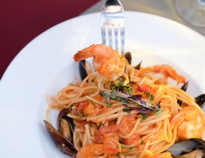 Close-up of a seafood pasta plate served at South Beach Hotel