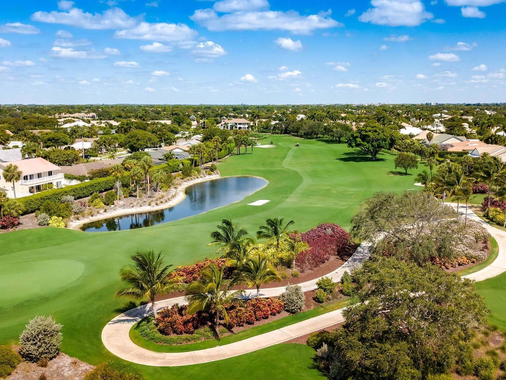 Aerial view of the golf course & lake in Boca Municipal Golf Course near Ocean Lodge Boca Raton