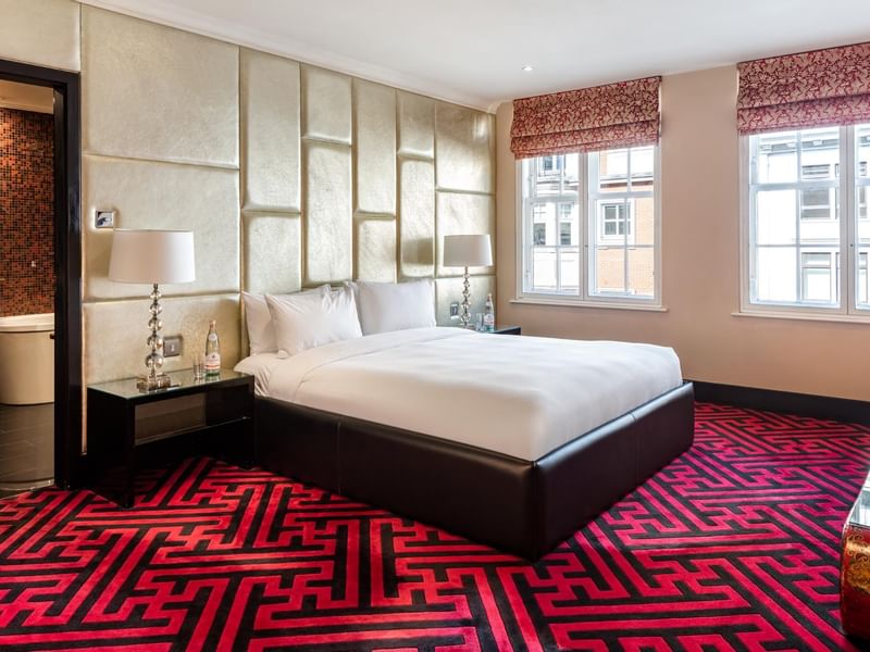 Interior of a room with king bed at The May Fair Hotel London