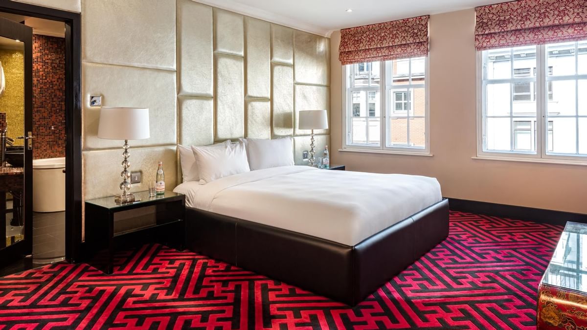 King bed in The Opium Suite at The May Fair Hotel London