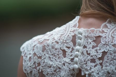 Close photo of shoulder and neck of wedding dress