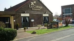 Exterior of La cottage restaurant at Le Cottage Hotel