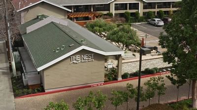 Aerial view of the hotel & car park at The Nest Palo Alto