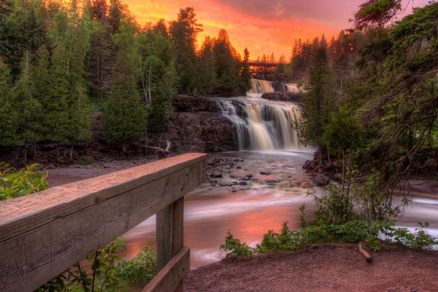 Waterfall with the sunset in the background near Lutsen Resort