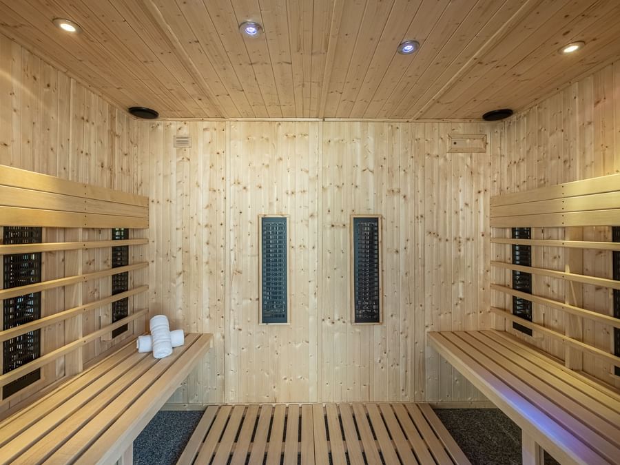 Wooden made sauna spa interior at The Originals Hotels