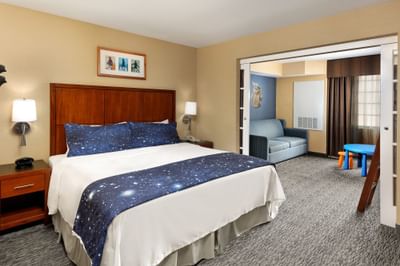 Star Wars themed bed & lounge in Galaxy Suite at Anaheim Portofino Inn, a Disneyland good neighbor hotel with kids suites