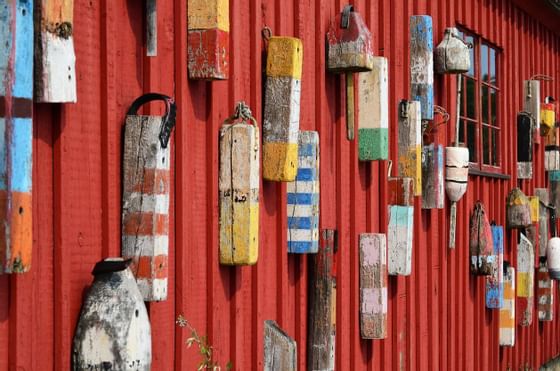 Old lobster buoys hanging wall at Beauport Hotel Gloucester