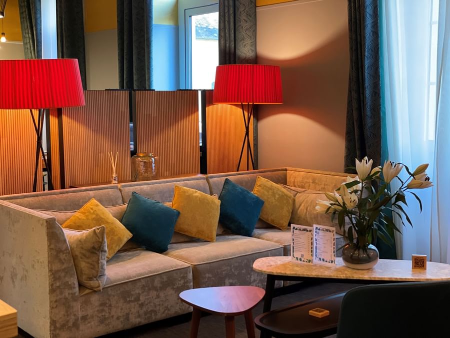 Luxury sofa & stand lamps at The Originals Hotels