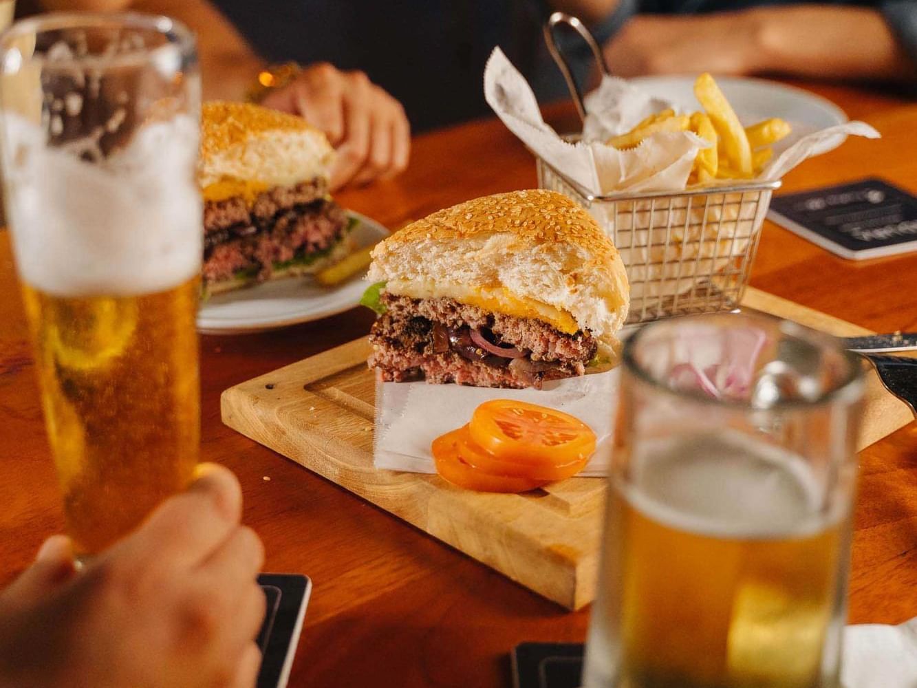 Close-up of burger served Sagadi Golf Lounge at Indura Resort