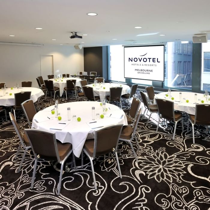 Banquet tables setup for meeting at Novotel Melbourne on Collin