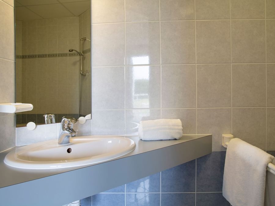 Bathroom vanity in bedrooms at Le Clos de l'Orgerie