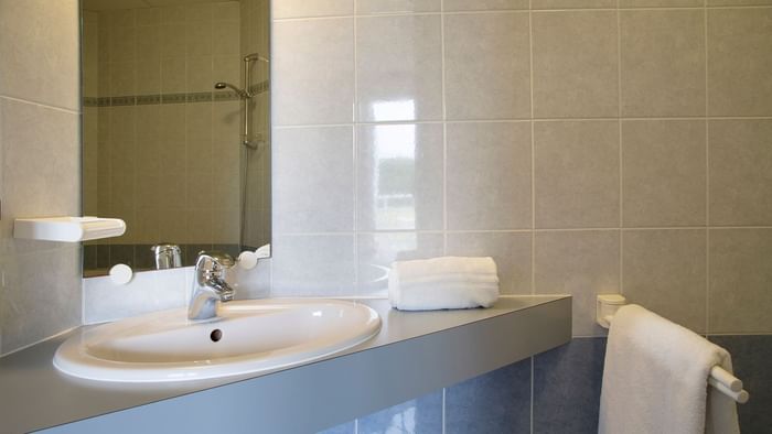 Bathroom vanity in bedrooms at Le Clos de l'Orgerie