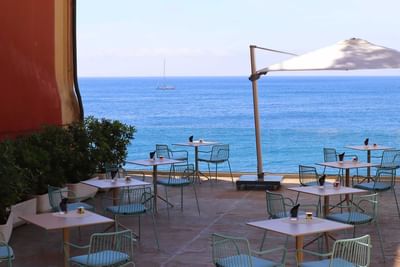 Informal table set-up on terrace at Sublimis Boutique Hotel Camogli