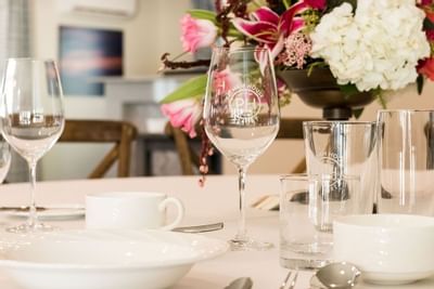 glasses and plates on a table