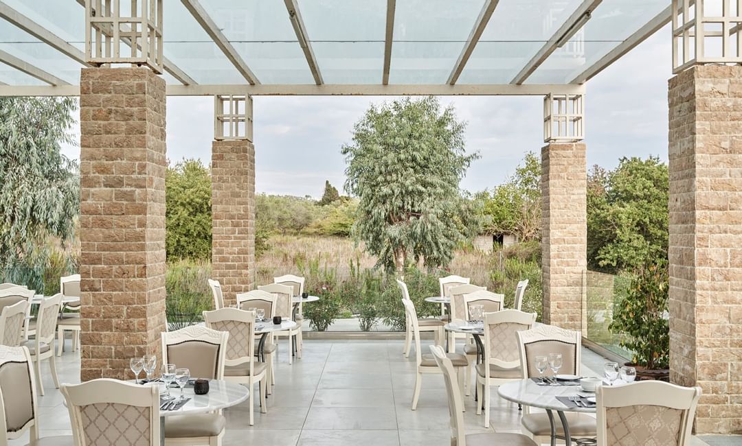 Dining table setup on the terrace at Kairaba Hotel