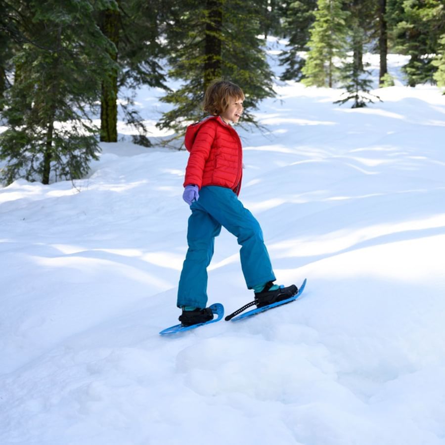 Child snowshoeing