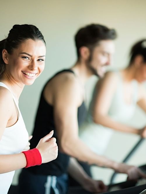 People on treadmills at Gym Center in Princess Mundo Imperial