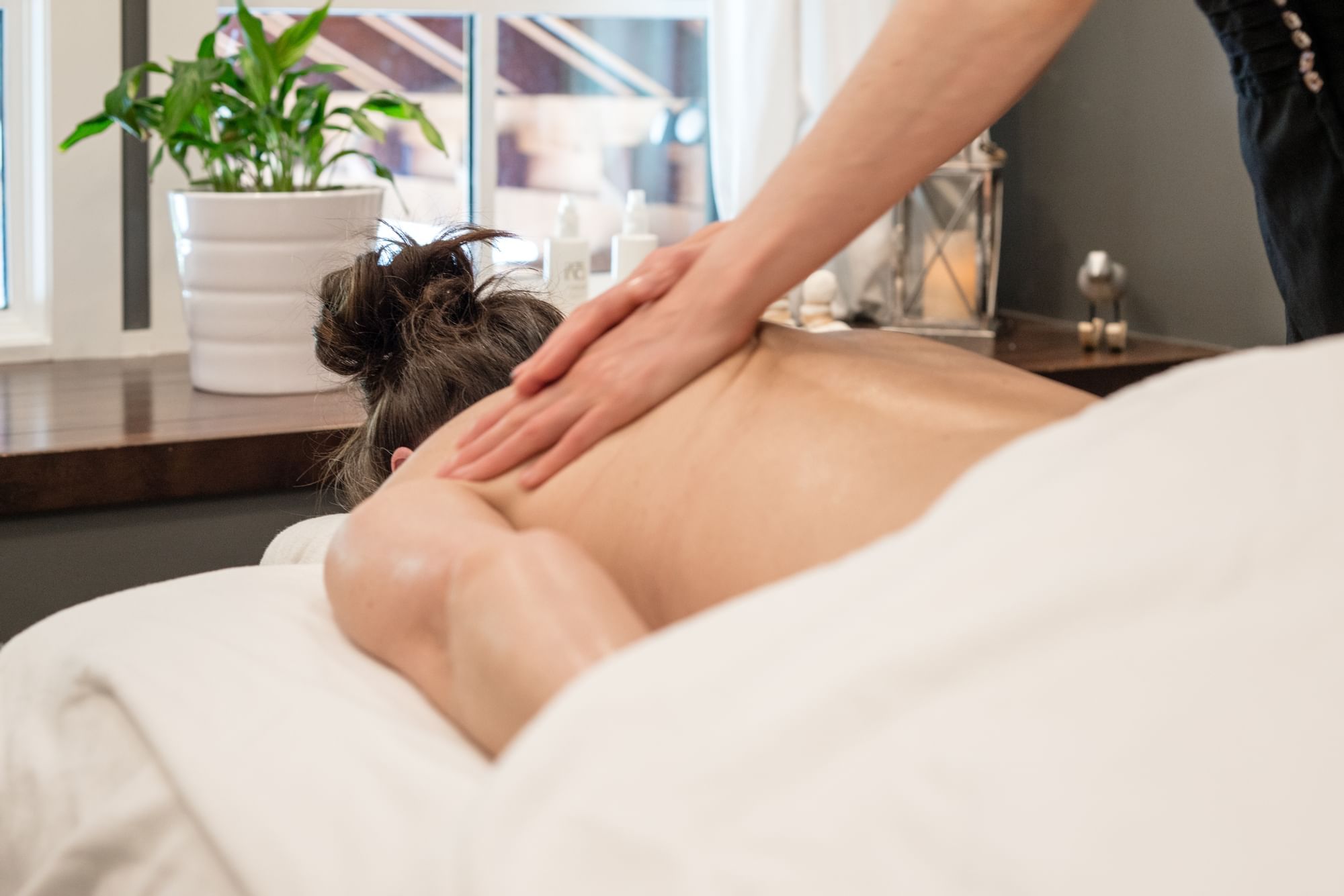 Lady getting a Spa body massage at Nita Lake Lodge