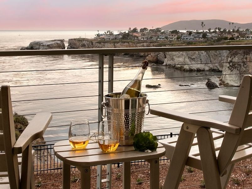 a bottle of wine and two glasses