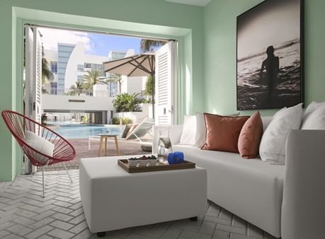 Livingroom area in a Suite with a pool view at The Diplomat Resort