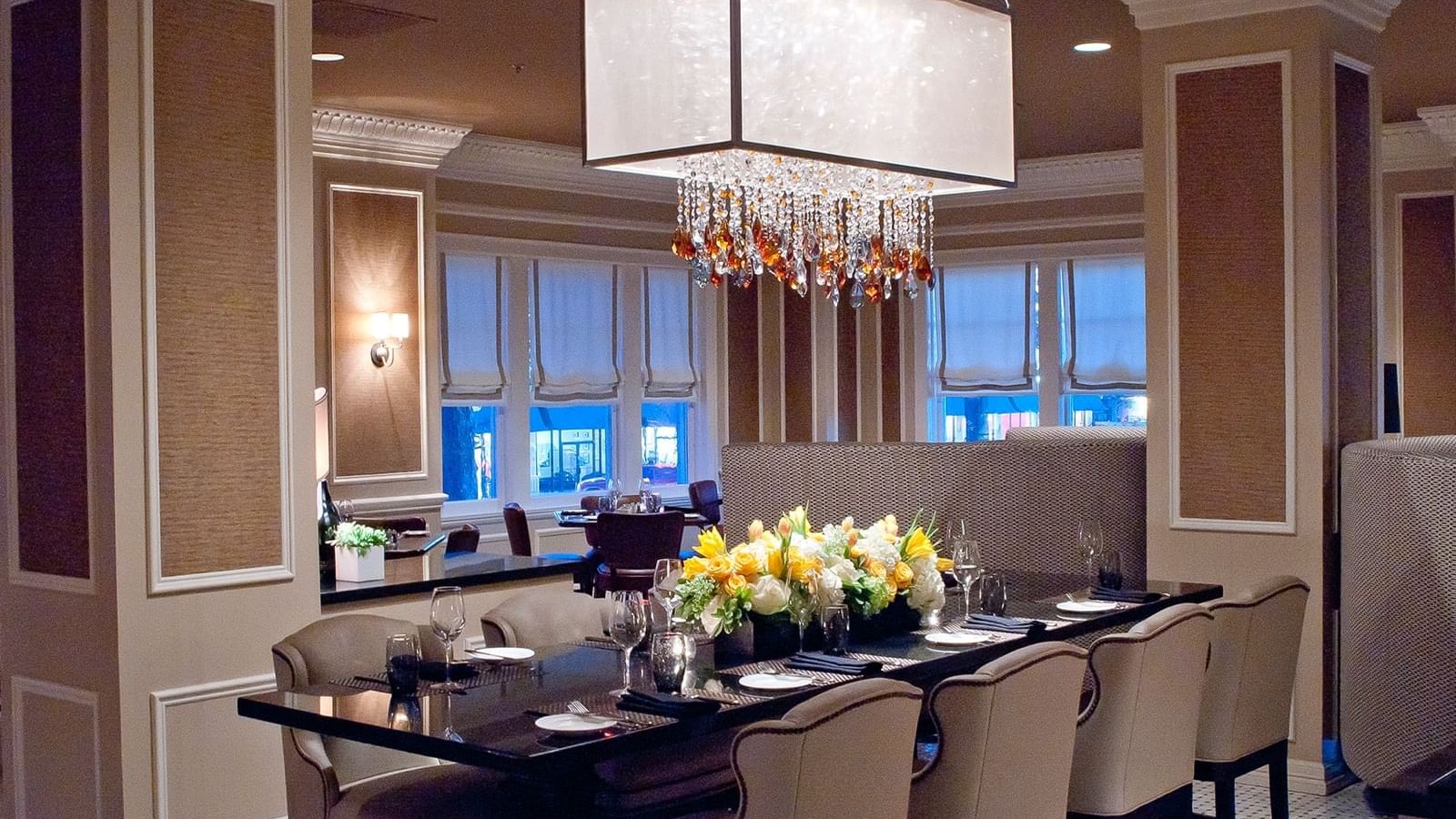 Conference table set up for an event at Warwick Melrose Dallas