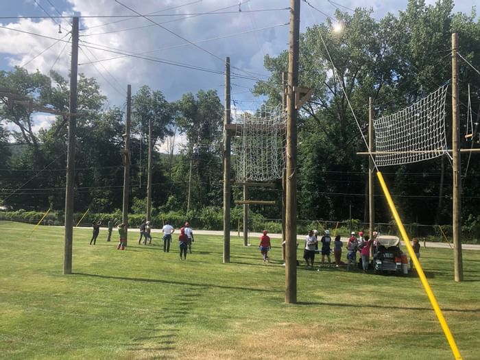 People at a Ropes course ground at Honor’s Haven Retreat