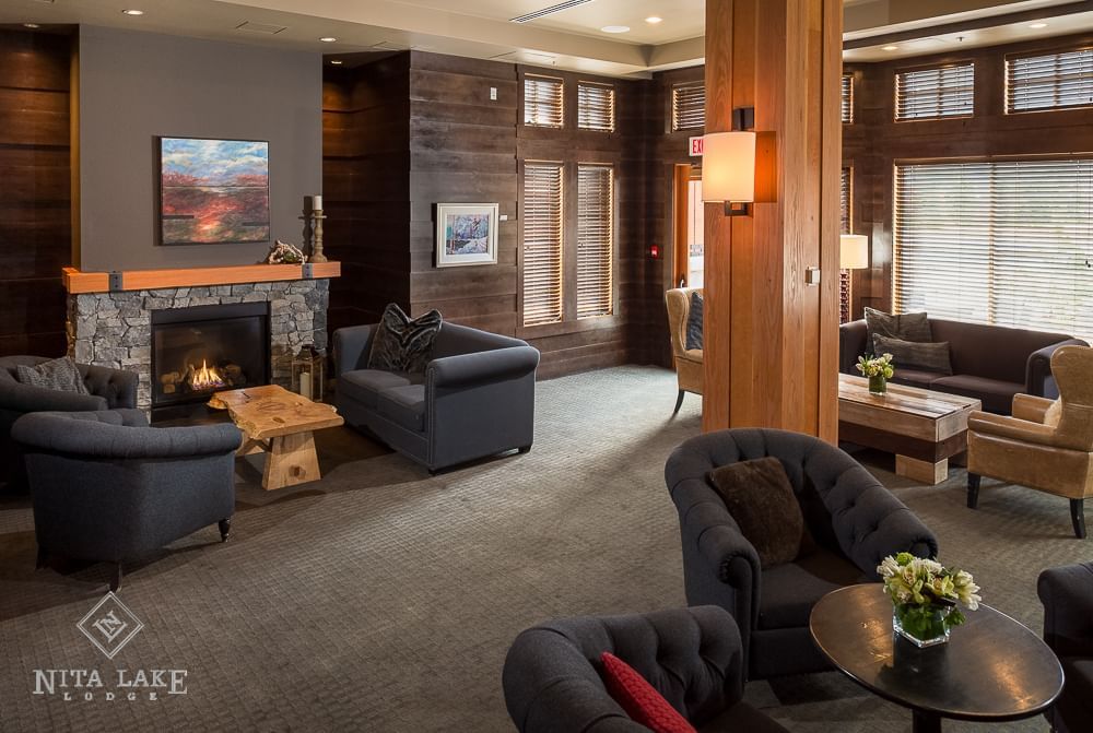 Lounge area & fireplace in Cure Lounge & Patio, Nita Lake Lodge