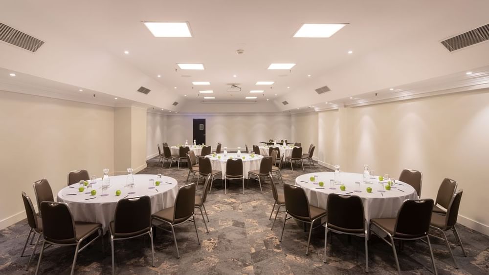 Hibiscus Conference Room with set up banquets at Novotel Sydney International Airport 