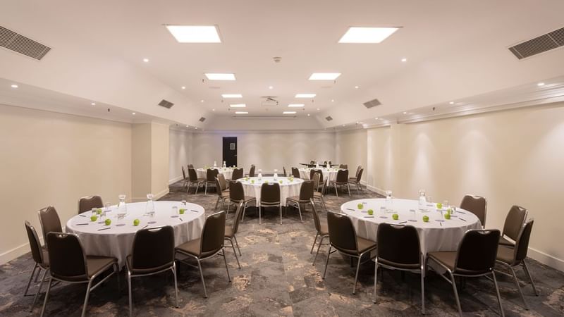 Hibiscus Conference Room with set up banquets at Novotel Sydney International Airport 