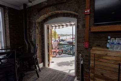 Front entrance of a Restaurant with a lake view at River Street Inn