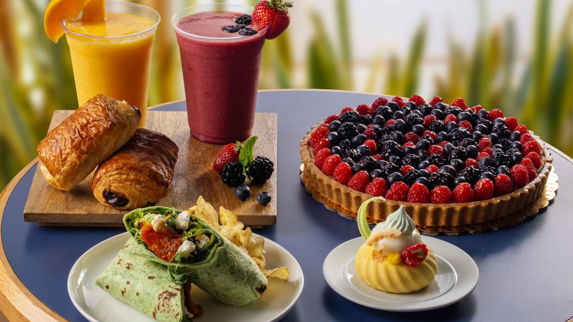 Assorted pastries and sweets served with smoothies at The Press, The Diplomat Resort