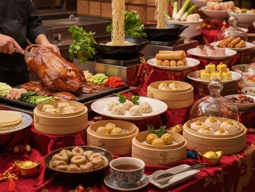 Lunar New Year buffet night at Pacifica restaurant at Paradox Phuket Hotel, Karon Beach, with red lantern decorations, Chinese dishes, dim sum, and live carving station.