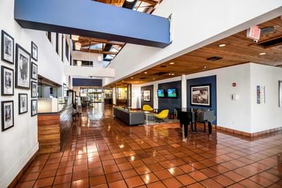 Elegant interior of the hotel lobby and reception area at Miami Lakes Hotel
