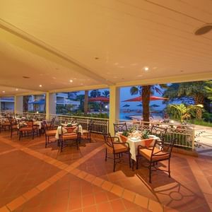 Outdoor dining area in Lake view Bar at Lake Kivu Serena Hotel