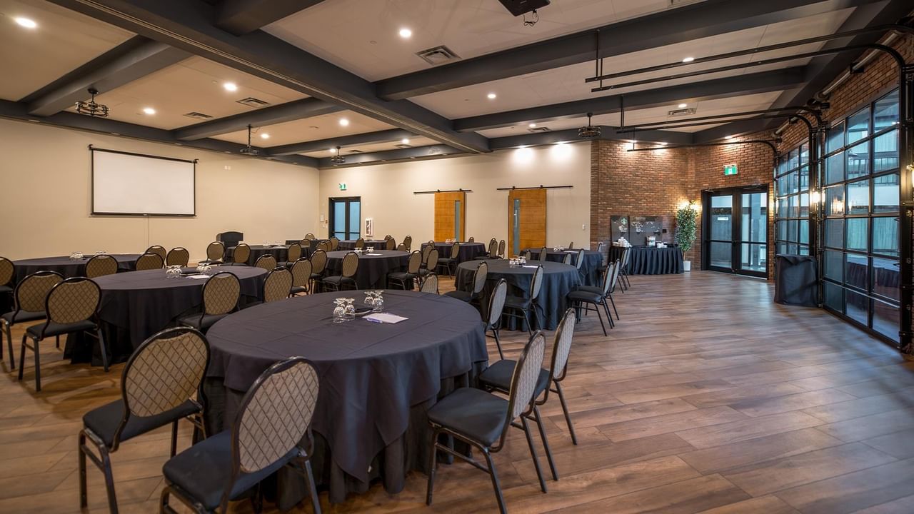 Conference room with tables and chairs.