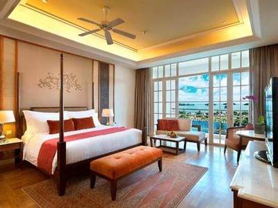 Viceroy bedroom with a king bed & a TV at The Danna Langkawi