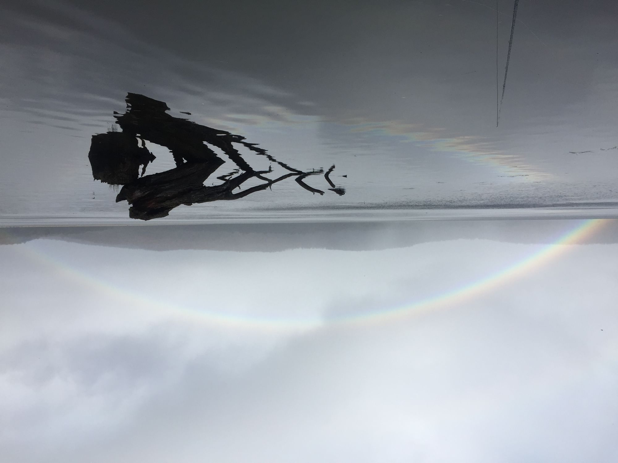 Rainbow reflection at Tasmania west coast near Strahan Village