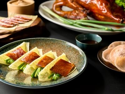 Plated peking duck served at Carlton Hotel Bangkok Sukhumvit