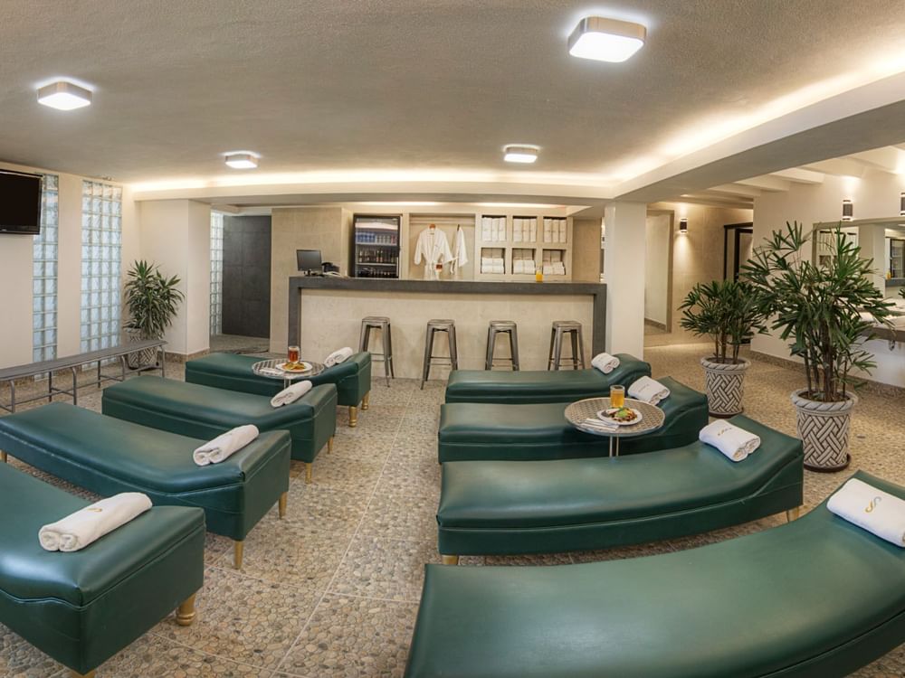 Interior of Spa with beds and a counter at Gamma Hotels