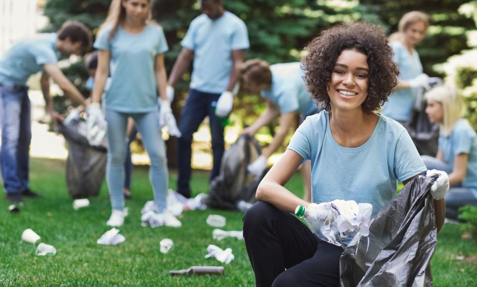 People collecting litter at Legacy Vacation Resorts