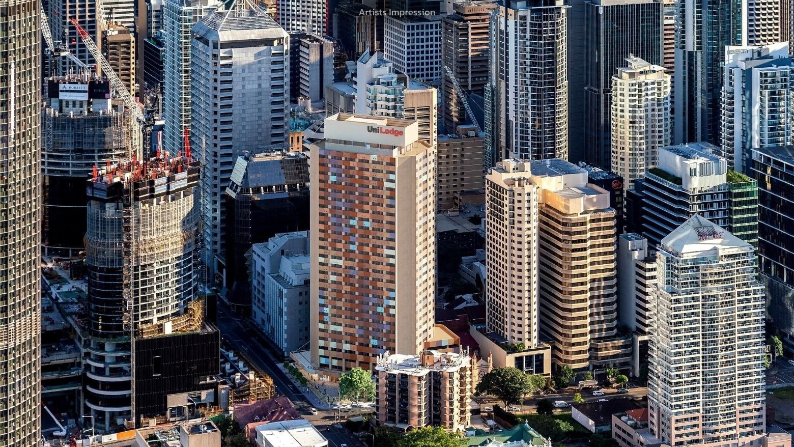 Aerial view of UniLodge Brisbane City among other tall buildings in urban area.